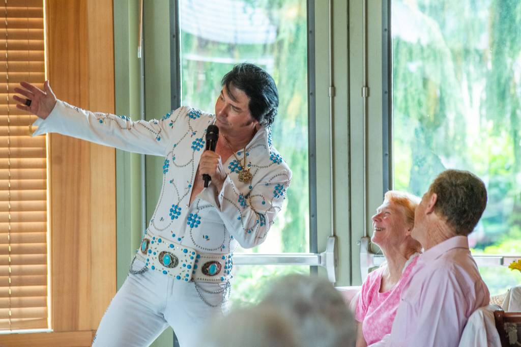 Elvis impersonator Danny Vernon performs for an attentive and appreciative audience at The Lodge at Sherwood Village.
