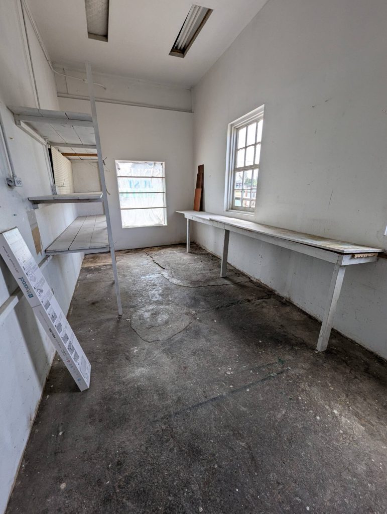 Photo courtesy of Talia Landau / A before shot of the side room and future location of washing stations at Little Shop of Hairdos.