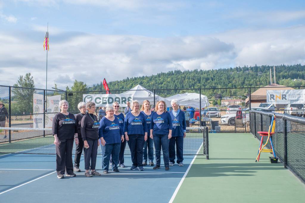 Sequim Gazette photo by Emily Matthiessen/ The Grand Olympics Chorus sang the national anthem at the beginning of Fridays round of competitions in the Sequim Fling.