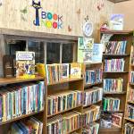 Sequim Gazette photo by Matthew Nash/ Childrens books remain a popular draw at the Friends of Sequim Library sale on the second Saturday of each month at Rock Plaza. Organizers said they plan to increase opportunities to purchase materials this year.