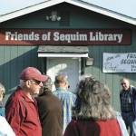Sequim Gazette file photo by Matthew Nash/ The Friends of Sequim Library sale was once held behind the Sequim Library in a small building, but it has since moved to Rock Plaza in recent years to accommodate the librarys renovation and expansion.