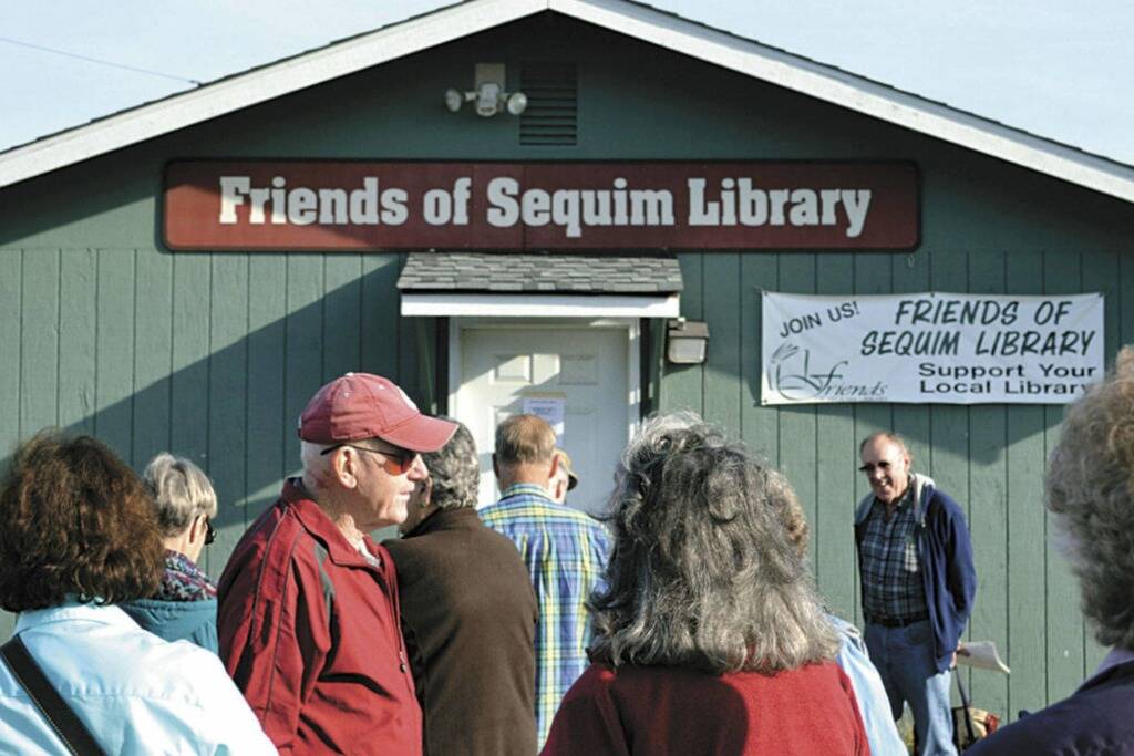 Sequim Gazette file photo by Matthew Nash/ The Friends of Sequim Library sale was once held behind the Sequim Library in a small building, but it has since moved to Rock Plaza in recent years to accommodate the librarys renovation and expansion.