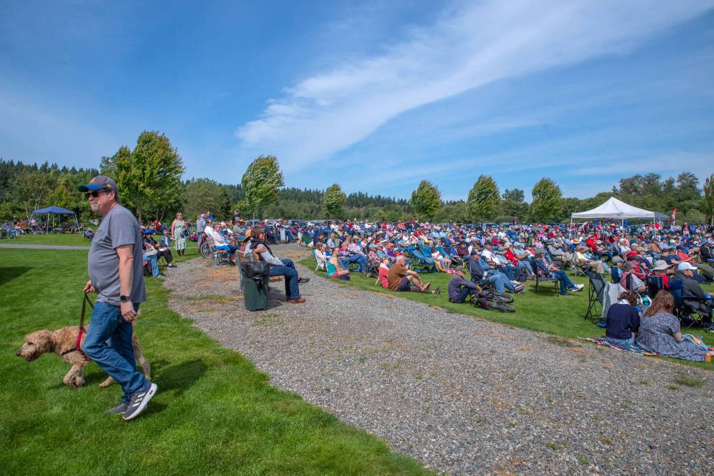 Sequim Gazette photo by Emily Matthiessen/ A large crowd gathered to listen to the Sequim City Band play patriotic songs on Independence Day at the James Center for the Performing Arts in Carrie Blake Community Park.