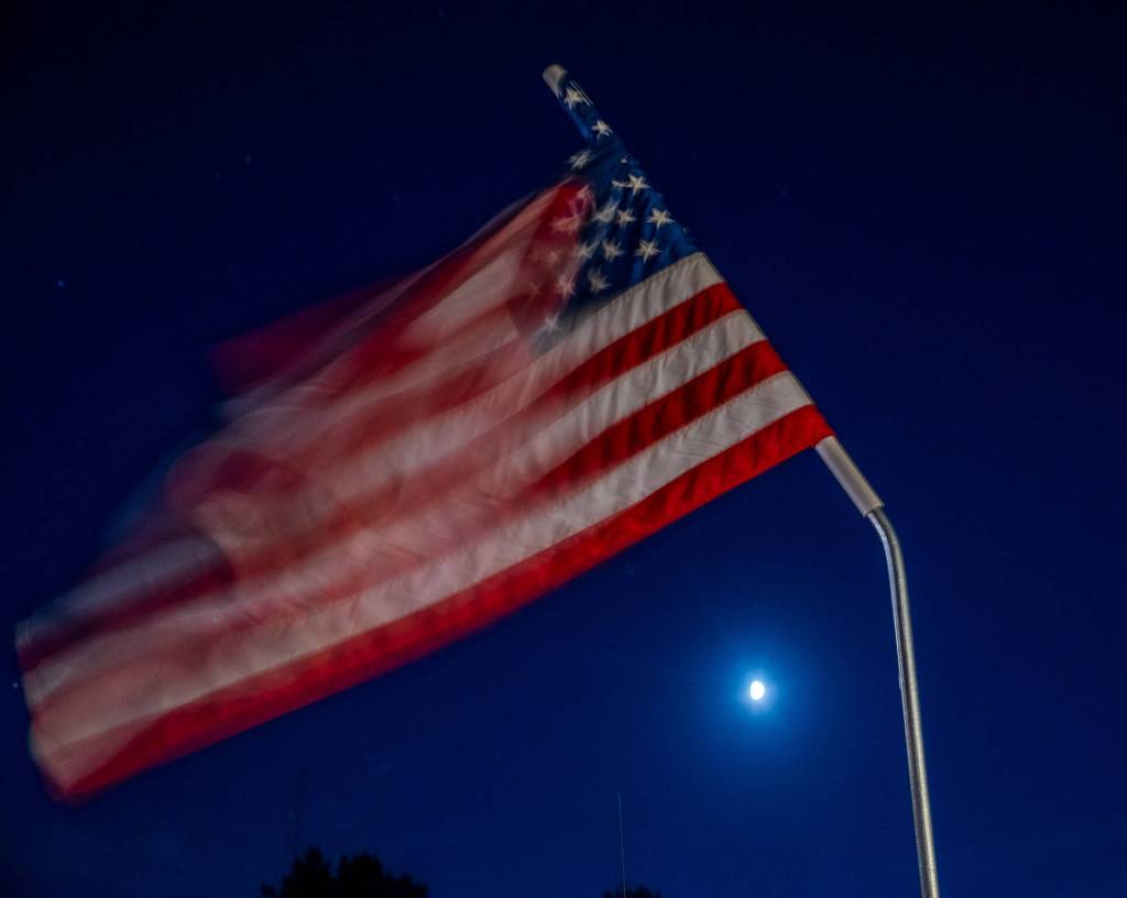 Sequim Gazette photo by Emily Matthiessen/ The Star Spangled Banner doth wave, over Sequim at the close of the Independence Day celebrations on Friday.