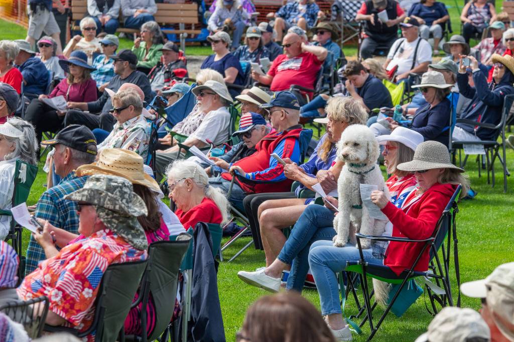 Sequim Gazette photo by Emily Matthiessen/ As is usual during outside events in Sequim, there were a number of well-behaved dogs at the Independence Day celebration in Carrie Blake Community Park.