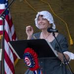 Sequim Gazette photo by Emily Matthiessen/ Sequims Karla Morgan helps lead the Sequim City Bands A Patriotic Fourth program during the Independence Day celebration on July 4 at Carrie Blake Community Park.