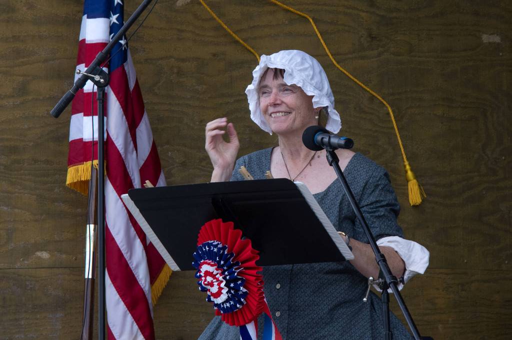 Sequim Gazette photo by Emily Matthiessen/ Sequims Karla Morgan helps lead the Sequim City Bands A Patriotic Fourth program during the Independence Day celebration on July 4 at Carrie Blake Community Park.