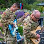Sequim Gazette photo by Emily Matthiessen/ Drummer Marcus Jaffe, bass player Joseph Ballestrasse and guitarist Glenn Devage rock out during the 133d Washington Army National Guard Bands performance on Friday at the City of Sequims Independence Day celebration in Carrie Blake Community Park.