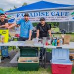 Sequim Gazette photo by Emily Matthiessen/ Refugio Castillo, Josue Gallegos and Francisco Hernandez of the Paradise Cafe serve up delicious tacos during the Independence Day celebration at Carrie Blake Community Park on Friday.