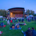 Sequim Gazette photo by Emily Matthiessen/ As Independence Day turns to night at Carrie Blake Community Park, people listen to the music of the band Great American Trainwreck.