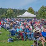 Sequim Gazette photo by Emily Matthiessen/ A large crowd gathered to listen to the Sequim City Band play patriotic songs on Independence Day at the James Center for the Performing Arts in Carrie Blake Community Park.