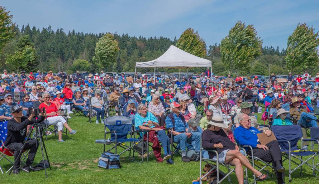 Sequim Gazette photo by Emily Matthiessen/ A large crowd gathered to listen to the Sequim City Band play patriotic songs on Independence Day at the James Center for the Performing Arts in Carrie Blake Community Park.