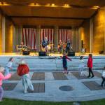 Sequim Gazette photo by Emily Matthiessen/ As Independence Day turns to night at Carrie Blake Community Park, children danced to the music of Great American Trainwreck.