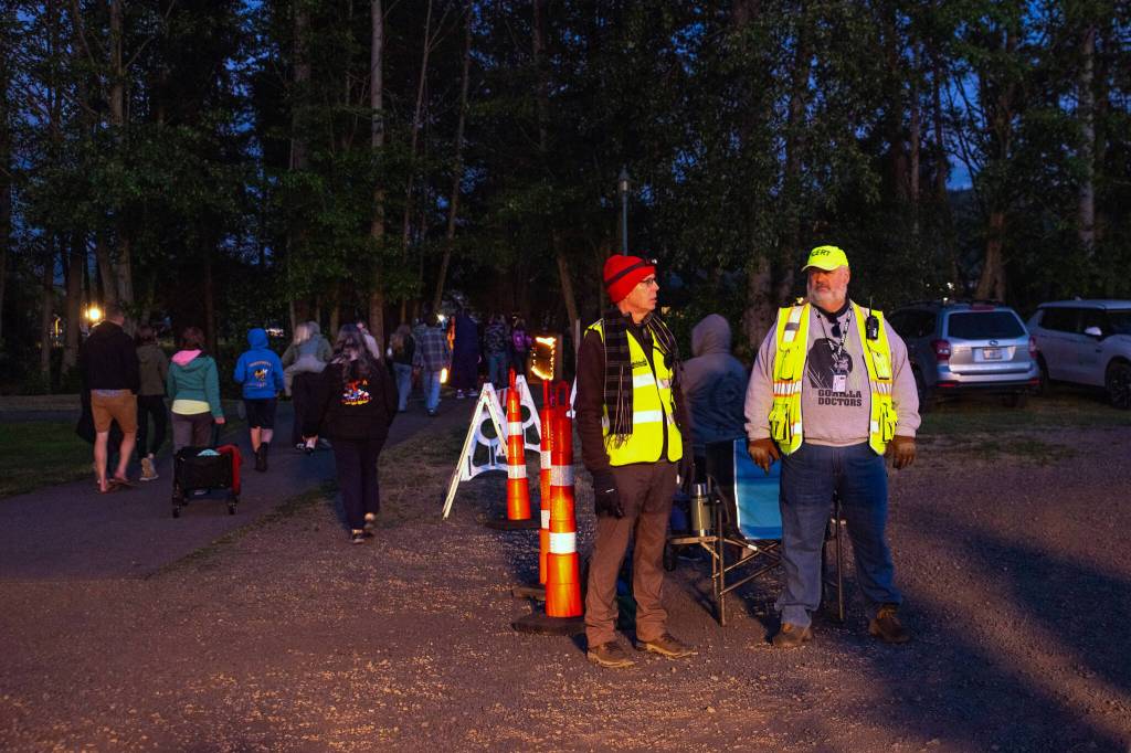 Sequim Gazette photo by Emily Matthiessen/ People head towards the prime viewing spot for fireworks during Sequim Citys Independence Day celebration on Friday.