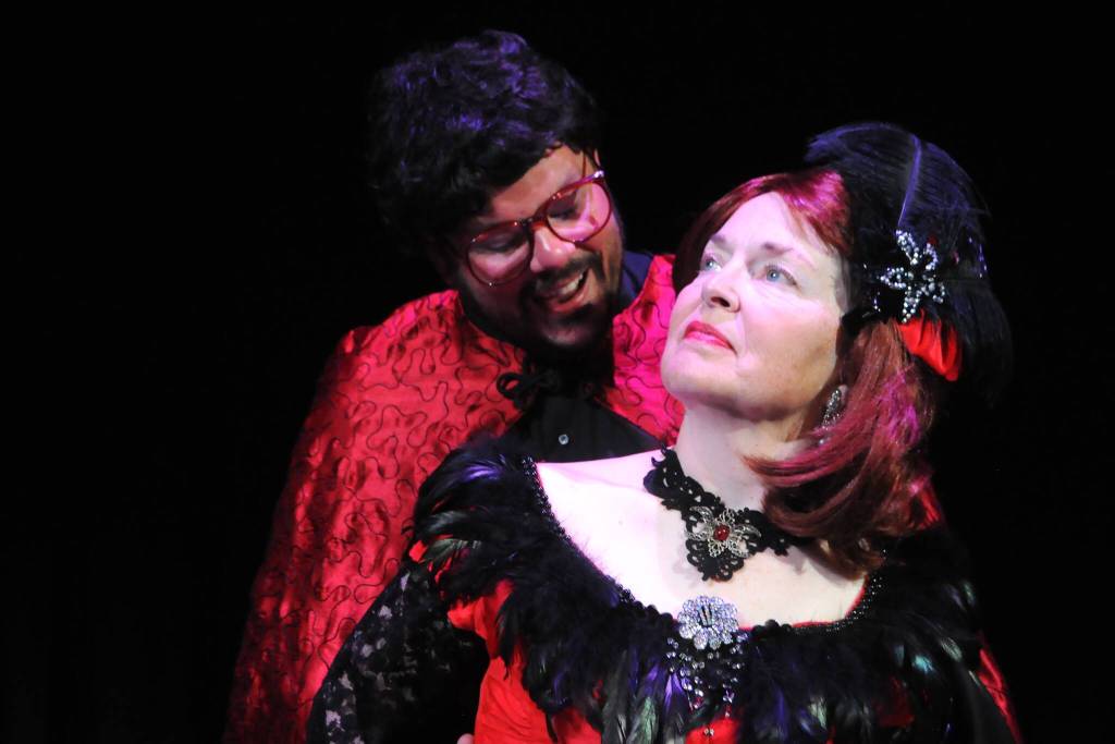 Sequim Gazette photo by Matthew Nash/ As Douglas Graves, the villain, actor Kyle Bartholick looks to take over Sequim and the world from townsfolk like Little Lottie (Joodie Klinke) in OTAs Lavender Legacies.