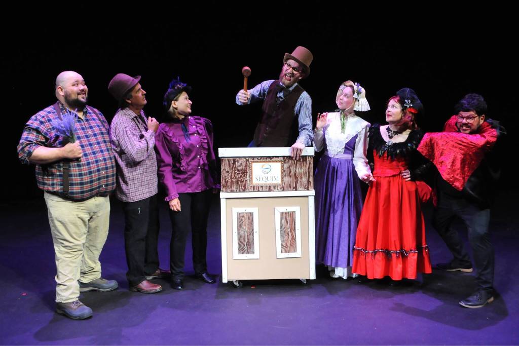 Sequim Gazette photo by Matthew Nash/ Mister Mayor (Matt Forrest) leads a city meeting in Lavender Legacies that pokes fun at nuances about Sequim and the Pacific Northwest. This year includes three new songs by David Herbelin and composer Ken Young.