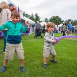 Sequim Gazette photo3 by Emily Matthiessen 
Jack Howell, 5, and his little brother Tommy, 2, of Yelm play with balloon swords at Carrie Blake Community Park during the 2025 Lavender Festival.