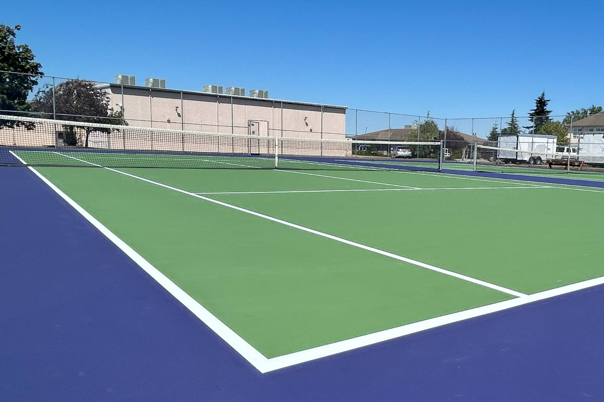 Sequim Gazette photo by Matthew Nash
The south tennis courts at Sequim High School were resurfaced in July thanks to an anonymous donation.