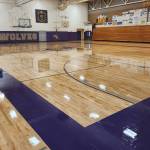 Photo courtesy Sequim School District
Since it was remodeled in early 2024, the first re-coat of finish was put on the main gym floor this summer at Sequim High School.