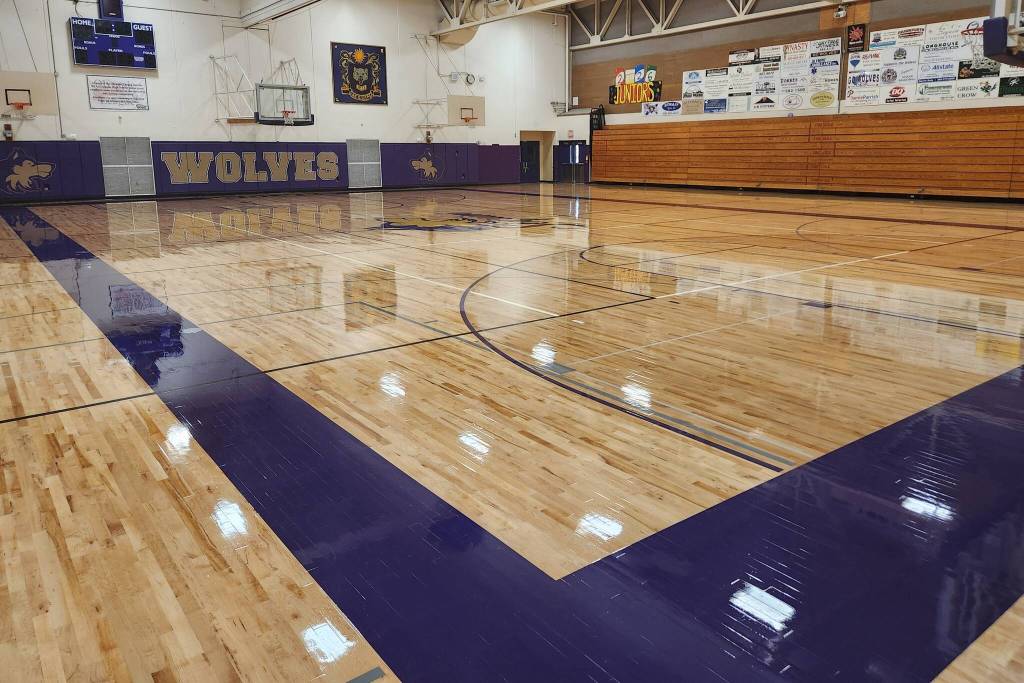 Photo courtesy Sequim School District
Since it was remodeled in early 2024, the first re-coat of finish was put on the main gym floor this summer at Sequim High School.