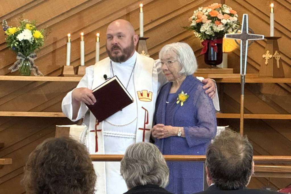 Photo courtesy of Faith Lutheran Church/ Pastor Roger Stites honors Pat Marcy on June 1 for her 50 years of service leading music at Faith Lutheran Church.