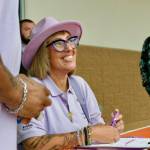 Sequim Gazette photo by Jacques Star
Alicia Liggins beams as she checks in families for H.U.M.A.N.s Shoes for Souls shopping event at Ross Dress for Less in Sequim on Saturday, Aug. 2.