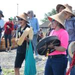 Sequim Gazette photo by Jacques Star/ Jamestown SKlallam Tribal elder Candace Burkhardt and tribal council member Loni Grinnell-Greninger sing to welcome the weary travelers after a long journey.