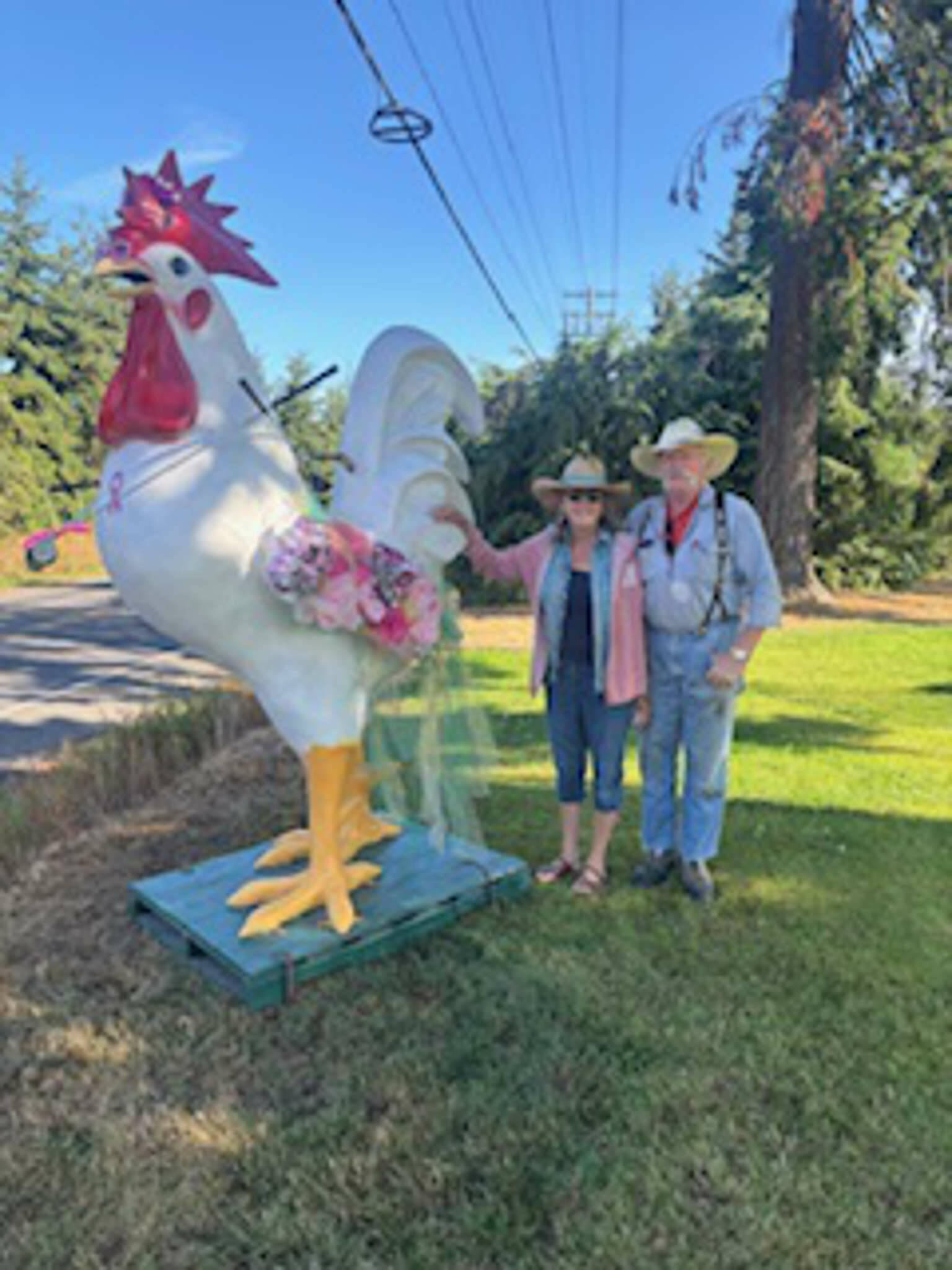 Photo courtesy of Janet Real/
This large rooster at hole #2, courtesy of Dave and Trisha Bekkevar (pictured), will welcome participants in Saturdays annual Drive for the Cure fundraiser sponsored by the Sunland Womens Golf Association.