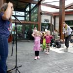 Jennifer LuBecke with North Olympic Library System (NOLS) leads Nature Storytime outdoors at the Dungeness River Nature Center in Sequim on Tuesday, Aug. 5. The program entertained tykes with nature-related stories, songs and rhymes.