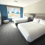 Photo courtesy Wirta Hospitality Worldwide/ Rooms in the Holiday Inn Express & Suites feature new beds, carpeting, outlets, and black-out shades.