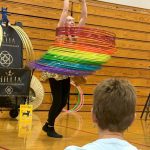 Hillia Hula encourages visitors of the Sequim Library Summer Reading Program by telling them that she learned to spin 40 hula hoops with just one to start.