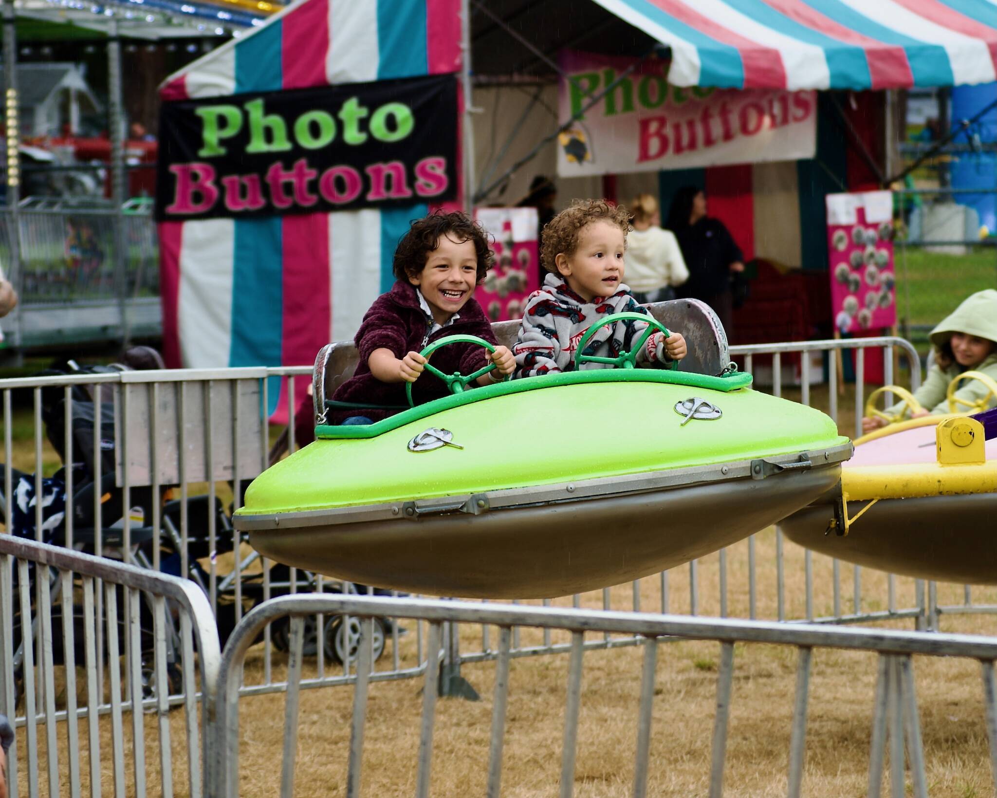 Sequim Gazette photos by Jacques Star 
Cevon Singleton, left, and Nolan Singleton enjoy a ride at the Clallam County Fair.
