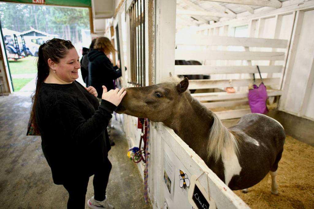 Michelle Osporn makes a new friend in Charlie, a Shetland pony.