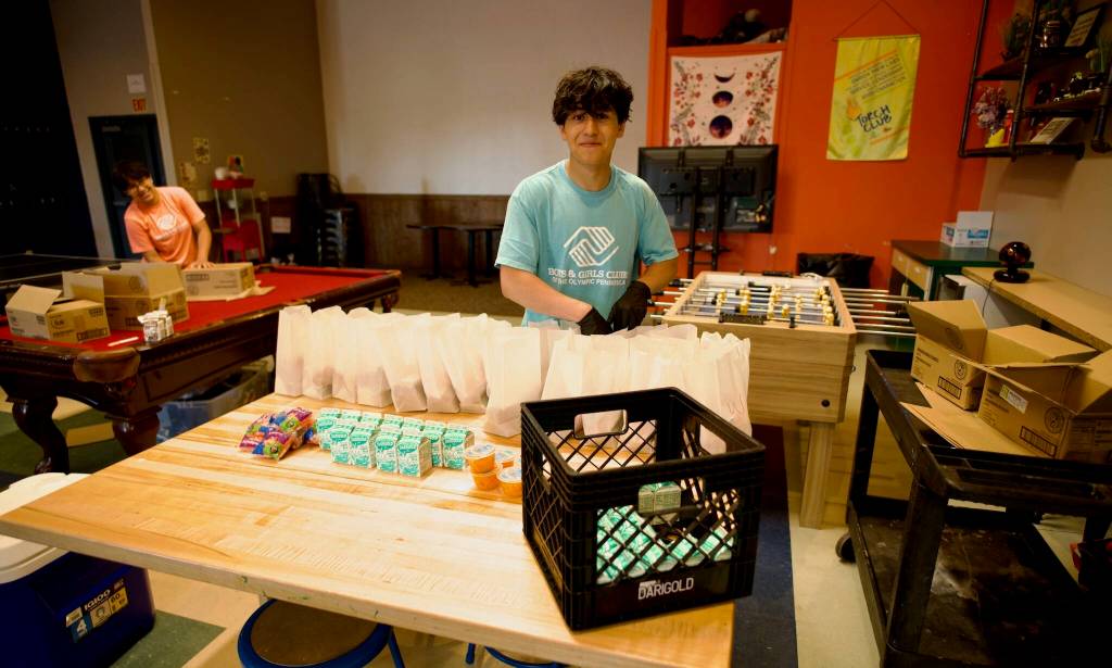 Sequiim Gazette photo by Jacques Star/ The training that Arrow Edgecomb, left, and Isaac Edgecomb received as paid employees of the Sequim Boys & Girls Club has helped prepare the siblings for the work force, according to director of philanthropy for the Boys & Girls Clubs of the Olympic Peninsula.