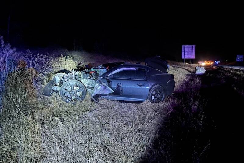 Photo courtesy Washington State Patrol/ A Chevrolet Camaro hit the back of a truck and trailer on Monday night that led to one man to be sent to Harborview Medical Center for non-life threatening injuries.
