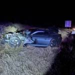 Photo courtesy Washington State Patrol/ A Chevrolet Camaro hit the back of a truck and trailer on Monday night that led to one man to be sent to Harborview Medical Center for non-life threatening injuries.