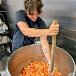 Photo courtesy of WSU Extension Program
Washington State University Extension Program Coordinator Danielle Carson stirs a big batch of tomato soup for freezing. Carson will present Preserving the Harvest to help local gardeners and farmers learn to preserve food on Thursday, Sept. 25 from 6-8 p.m. at St. Andrews Episcopal Church, 510 E. Park Ave. in Port Angeles.