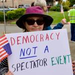 Christa Martin of Sequim voices her opinion and participates in freedom of expression.