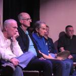 Sequim Gazette photo by Matthew Nash/ Actors in Inherit the Wind await a scene to start in OTAs Gathering Hall at a recent rehearsal. The space has been transformed to feel like the audience is a part of the courtroom where Bert Cates is tried for teaching evolution in his classroom.