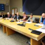 Olympic Peninsula News Group photo by Keith Thorpe
Olympic Medical Center commissioners and staff met last week in Port Angeles before signing a letter of intent to explore a service arrangement with UW Medicine. Pictured are, clockwise from left, Commissioner Tom Oblak, board executive assistant Gay Lynn Iseri, commissioners Penny Sanders and Philip Giuntoli, OMC Interim CEO Mark Gregson, board president Ann Henninger, and commissioners John Nutter, Thom Hightower and Jean Hordyk.