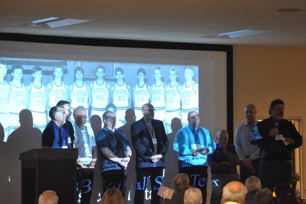 Sequim Gazette photo by Matthew Nash/ Most of the 1988 Sequim High School boys basketball team stands together as theyre inducted into Sequim High Schools Hall of Fame in 2025, its second year. The team finished second in state.