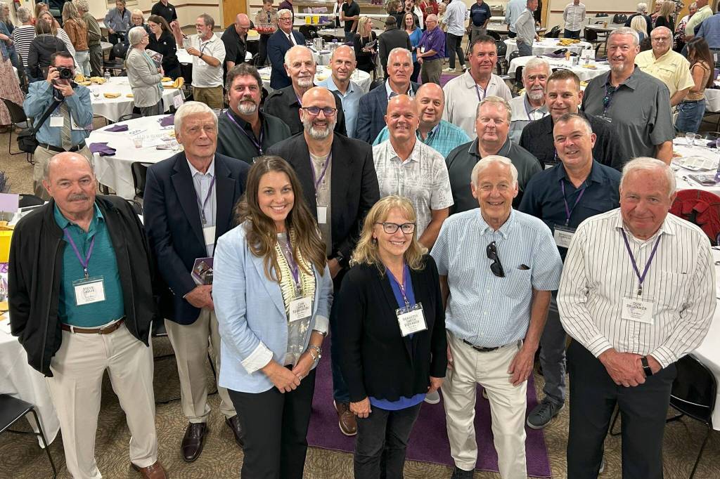 Sequim Gazette photo by Matthew Nash/ This years inductees of the Sequim High School Hall of Fame stand together for a group photo on Sept. 13.