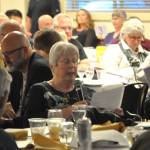 Sequim Gazette photo by Matthew Nash/ Roenah Blank, a classmate of Dick Ballard from the Sequim High School Class of 1955, reads his thank you to letter for being accepted to the Sequim High School Hall of Fame.