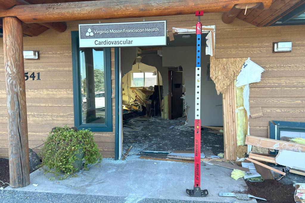 Sequim Gazette photo by Matthew Nash/ A Jeep drove into Virginia Mason Franciscan Health - Cardiovascular on Sept. 22 trapping its driver, passenger, and an employee inside the building.