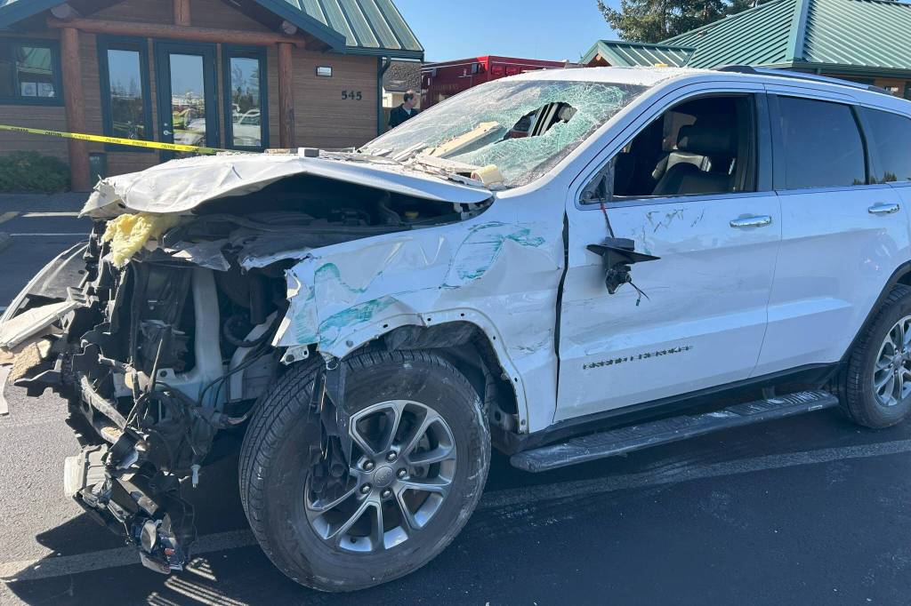 Sequim Gazette photo by Matthew Nash/ A Jeep was towed from a wreck on Sept. 22 after it drove into a medical building.
