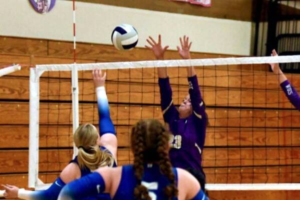 Sequim Gazette photo by Jacque Star/
Kenzie Berglund goes up for a block against Olympic players on Sept. 23.