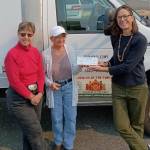 Jen Colmore, right, community engagement coordinator for Sequim Food Bank, accepts a donation of $2,150 from Soroptimist International of Sequim. The check was presented by Natasha Merkkuloff-Nichols, left, the organizations president-elect, and Sandy Lawrence, its treasurer.