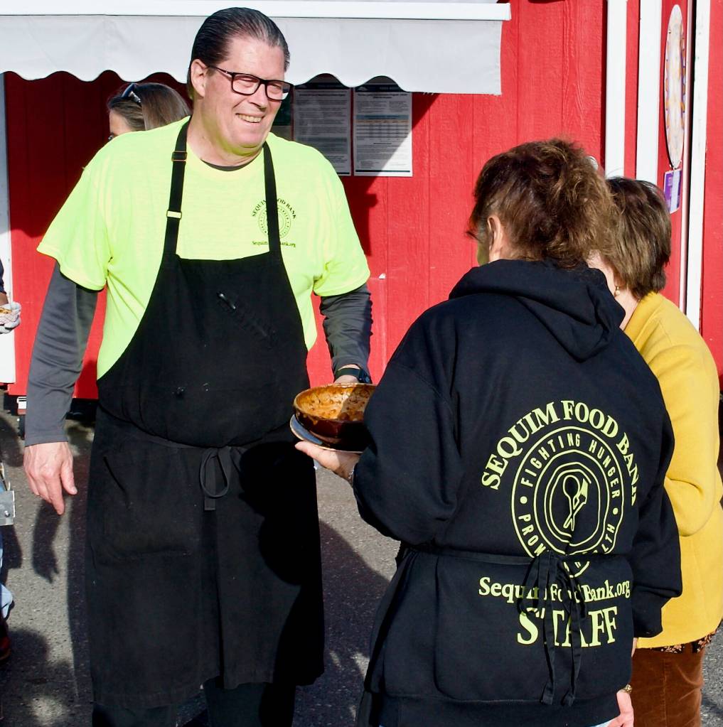 Sequim Gazette photo by Jacques Star/
Master Chef Chris Clemens, who has nearly 40 years of experience cooking and is a former culinary arts teacher at Olympic College, was among the volunteers who helped make the inaugural Everyone at the Table fundraiser at the Sequim Food Bank a success.