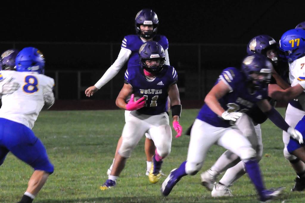 Sequim Gazette photo by Matthew Nash
Liam Wiker rushes against Bremerton at the Homecoming game on Oct. 3. He had two touchdown rushes in the 34-12 loss.