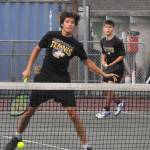 Sequim Gazette photo by Matthew Nash
Doubles team Sebastian Buhrer and Tegan Kurtze score a point against their North Mason opponents on Oct. 2. The duo won 6-4, 7-5.